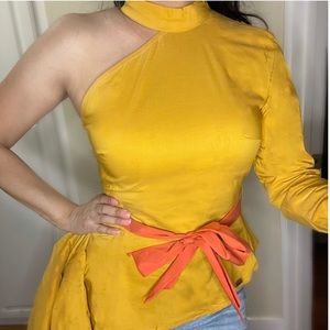 Available in sizes small, medium, and large. Yellow mustard color.